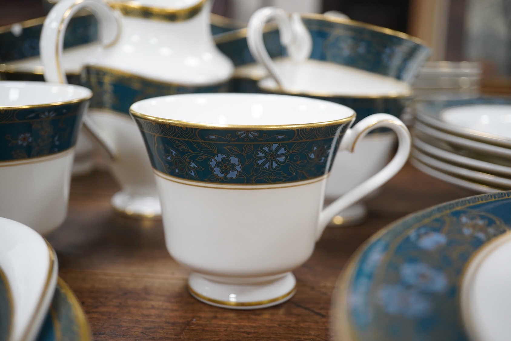 A Royal Doulton Carlyle pattern part dinner and tea service. Condition - appears good